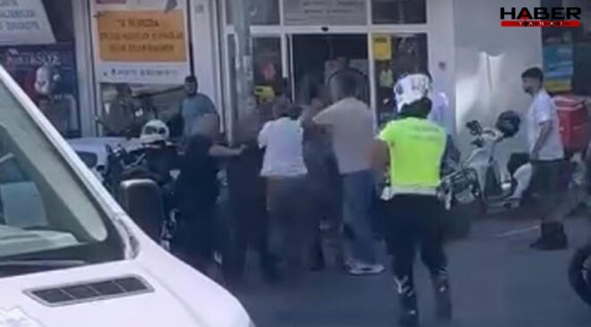 İzmir’de trafik polisine saldırı kamerada