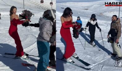 Kayak merkezinde kırmızı elbiseli kadını gören şaşırdı, yaptığı ise herkesi mest etti