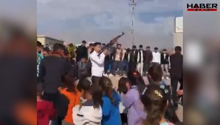 Onlarca çocuğun yanında uzun namlulu tüfekle havaya ateş açtılar