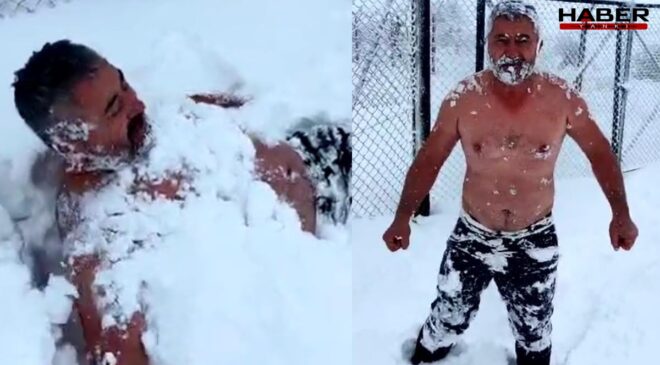 Karda soyunup kar banyosu yaptı