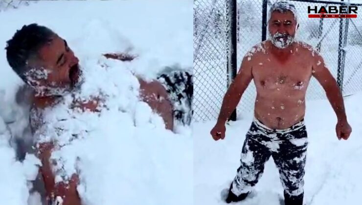 Karda soyunup kar banyosu yaptı